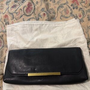 J. Crew Black and Gold Clutch Sleek Design-new, never used